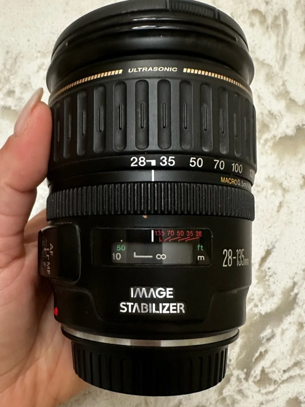 Canon Black Lens Cap with White and Gold Logos